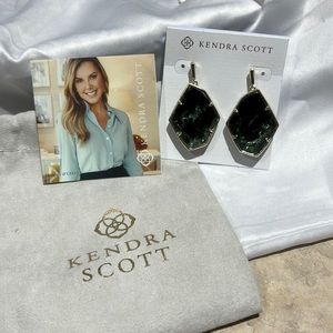 Kendra Scott never been worn earrings. In gold and green.